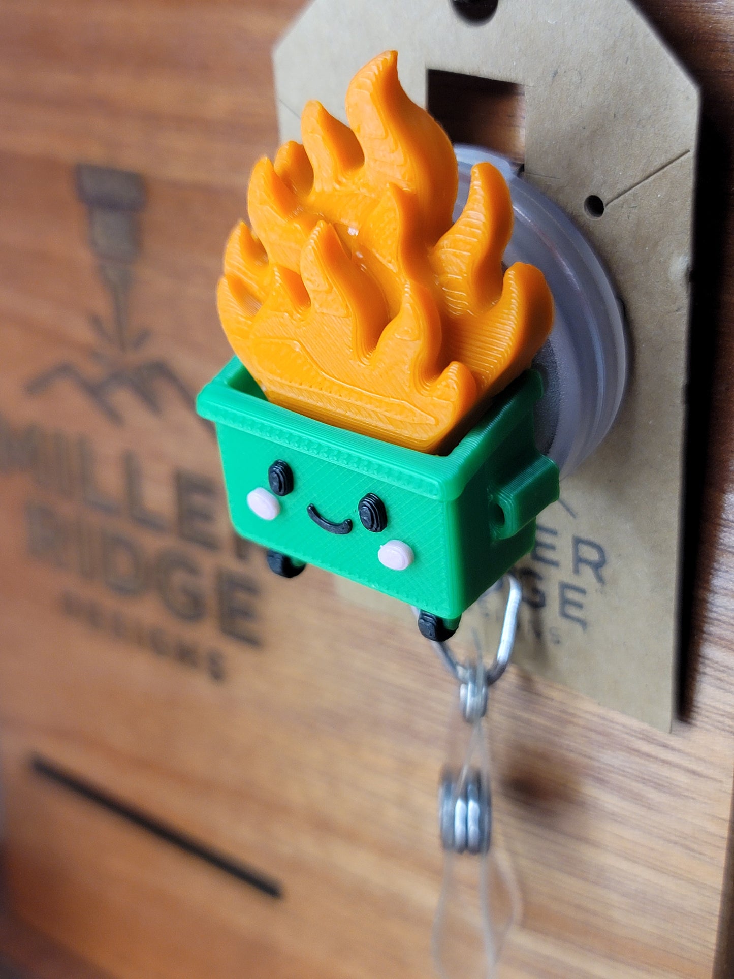 Dumpster fire badge reel (green)