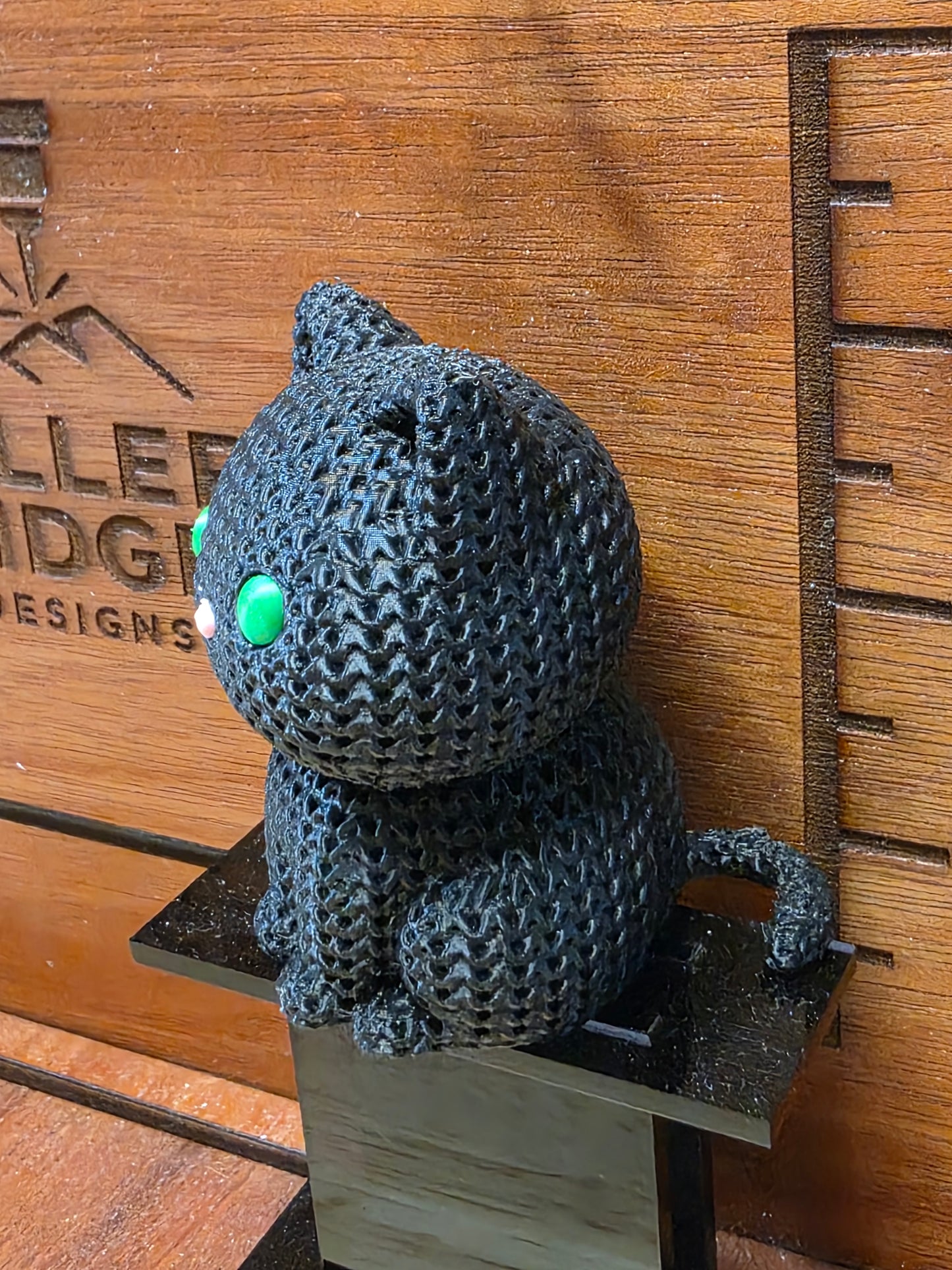 Black cat with green eyes