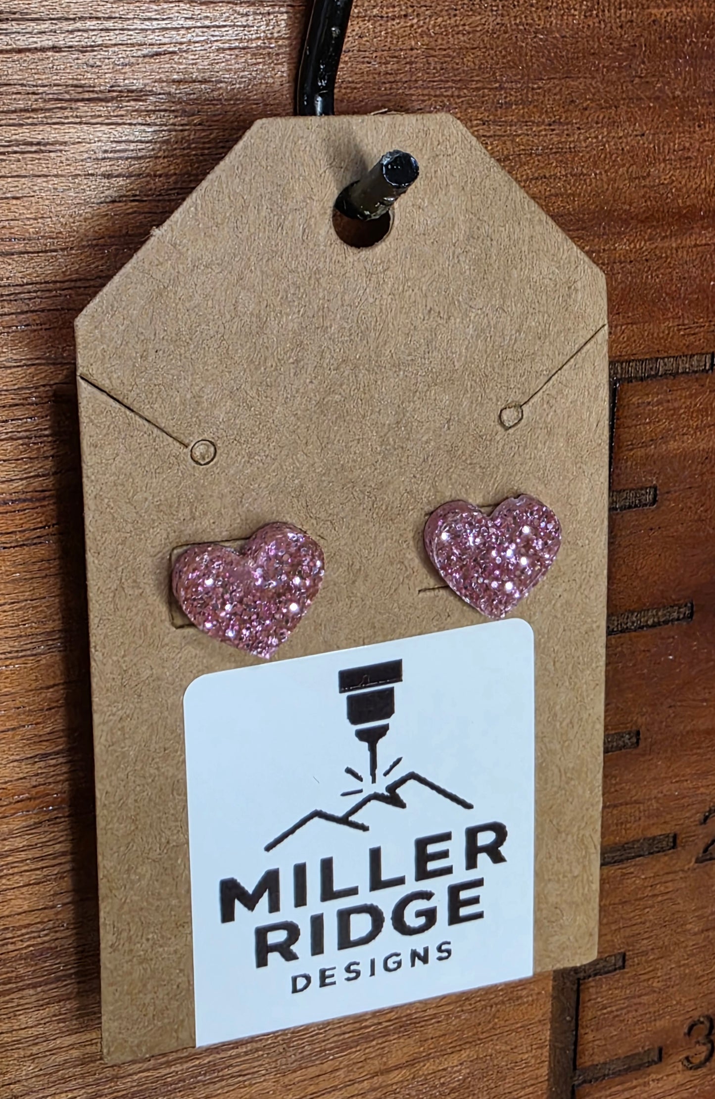 Pink glitter heart studs