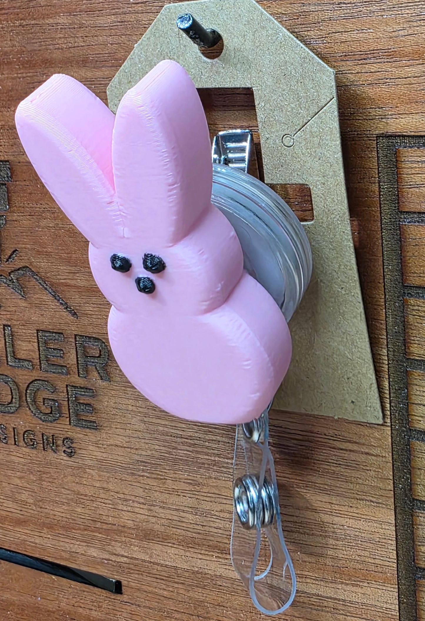 Pink "Peeps" bunny badge reel