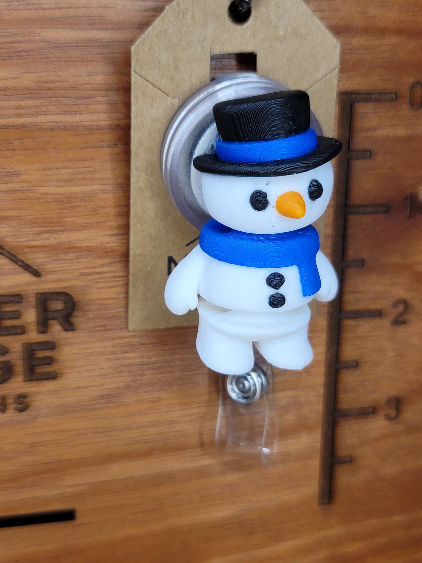Snowman badge reel (navy blue scarf)