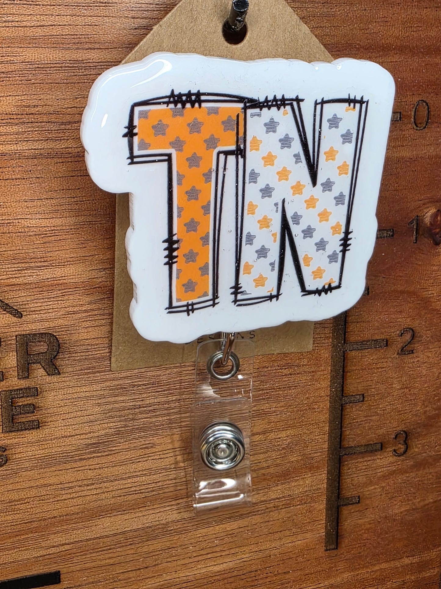 TN badge reel