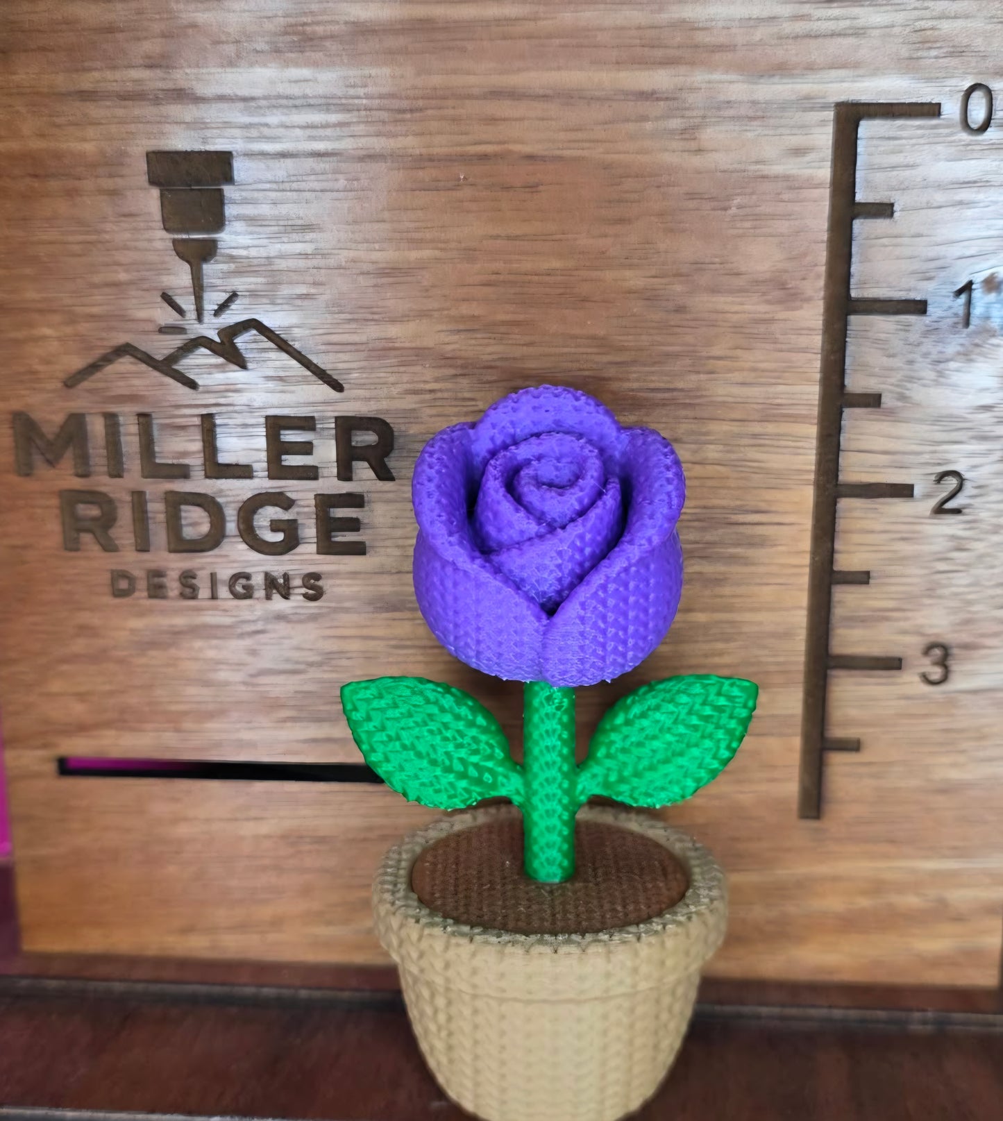 Knitted purple rose flower pot