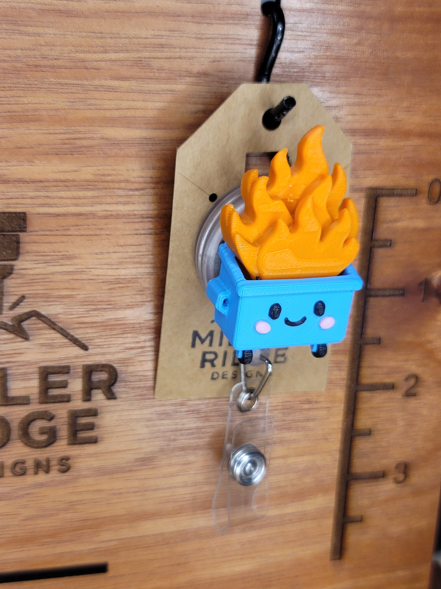 Dumpster fire badge reel (blue)