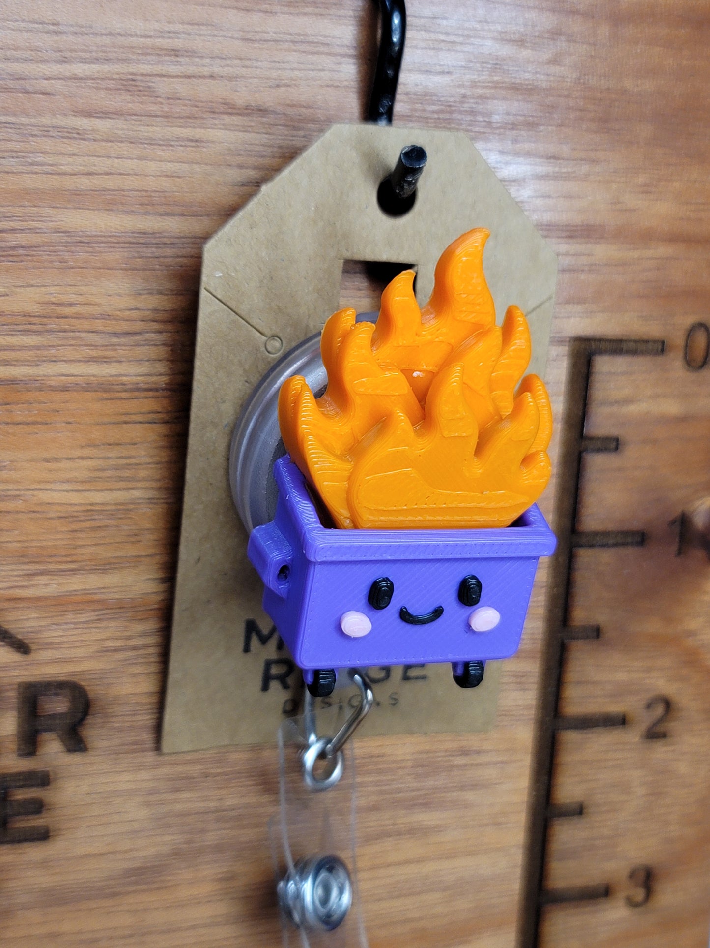 Dumpster fire badge reel (purple)