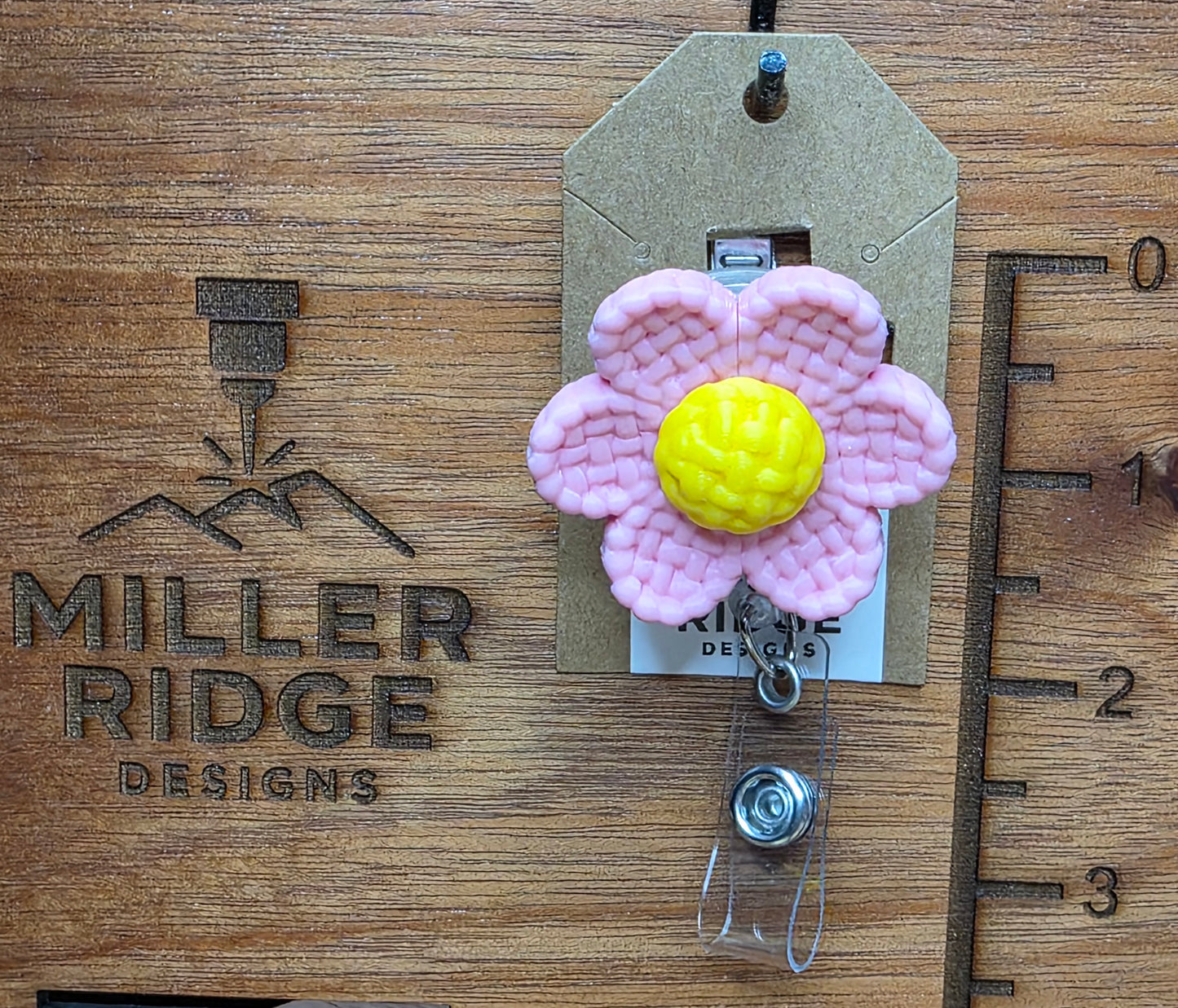 Pink daisy badge reel