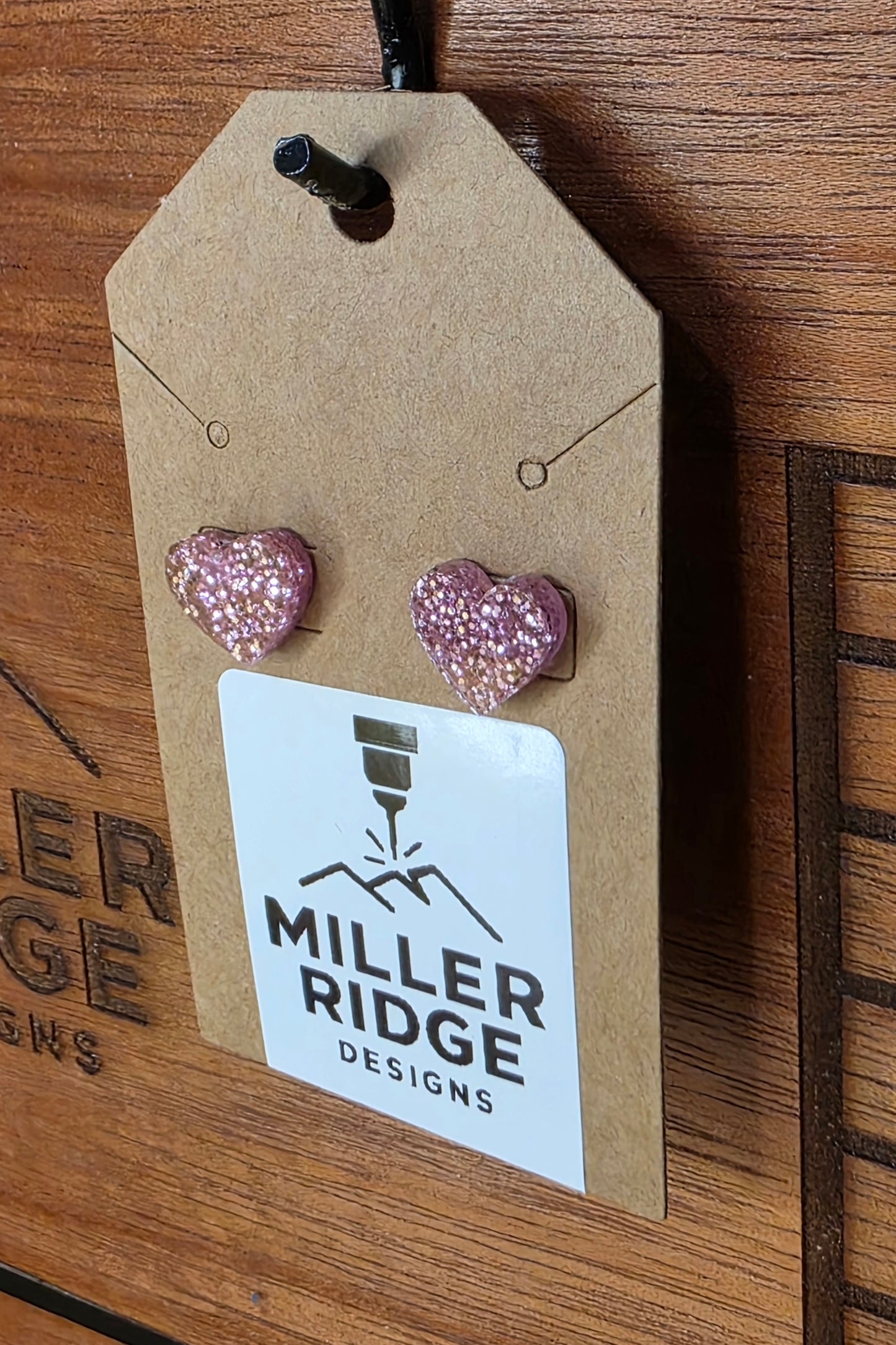 Pink glitter heart studs