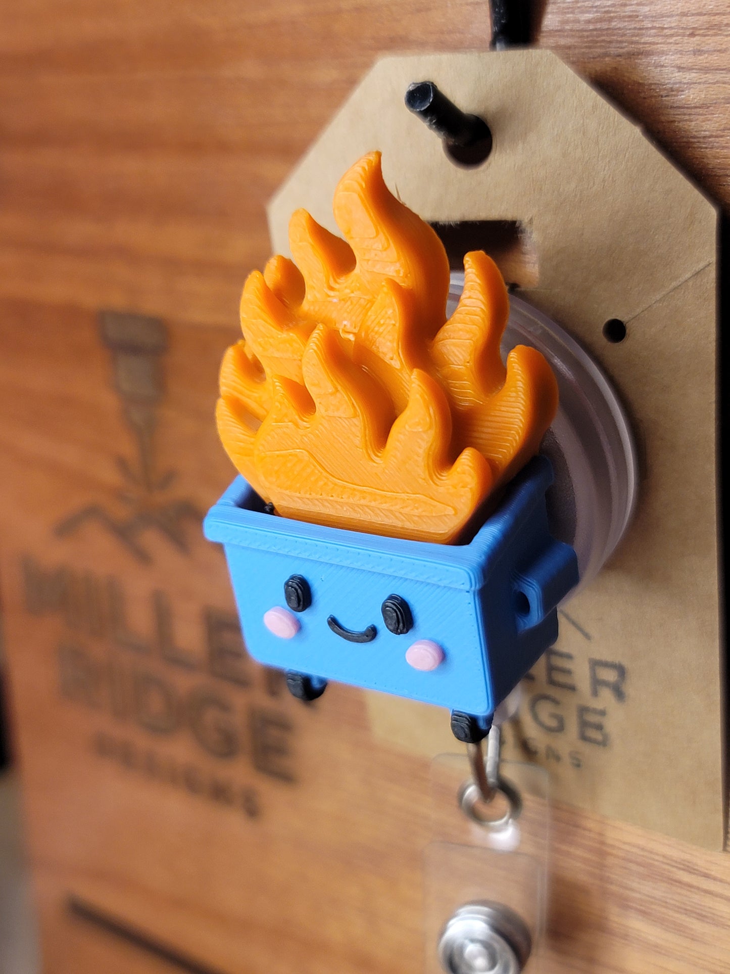 Dumpster fire badge reel (blue)