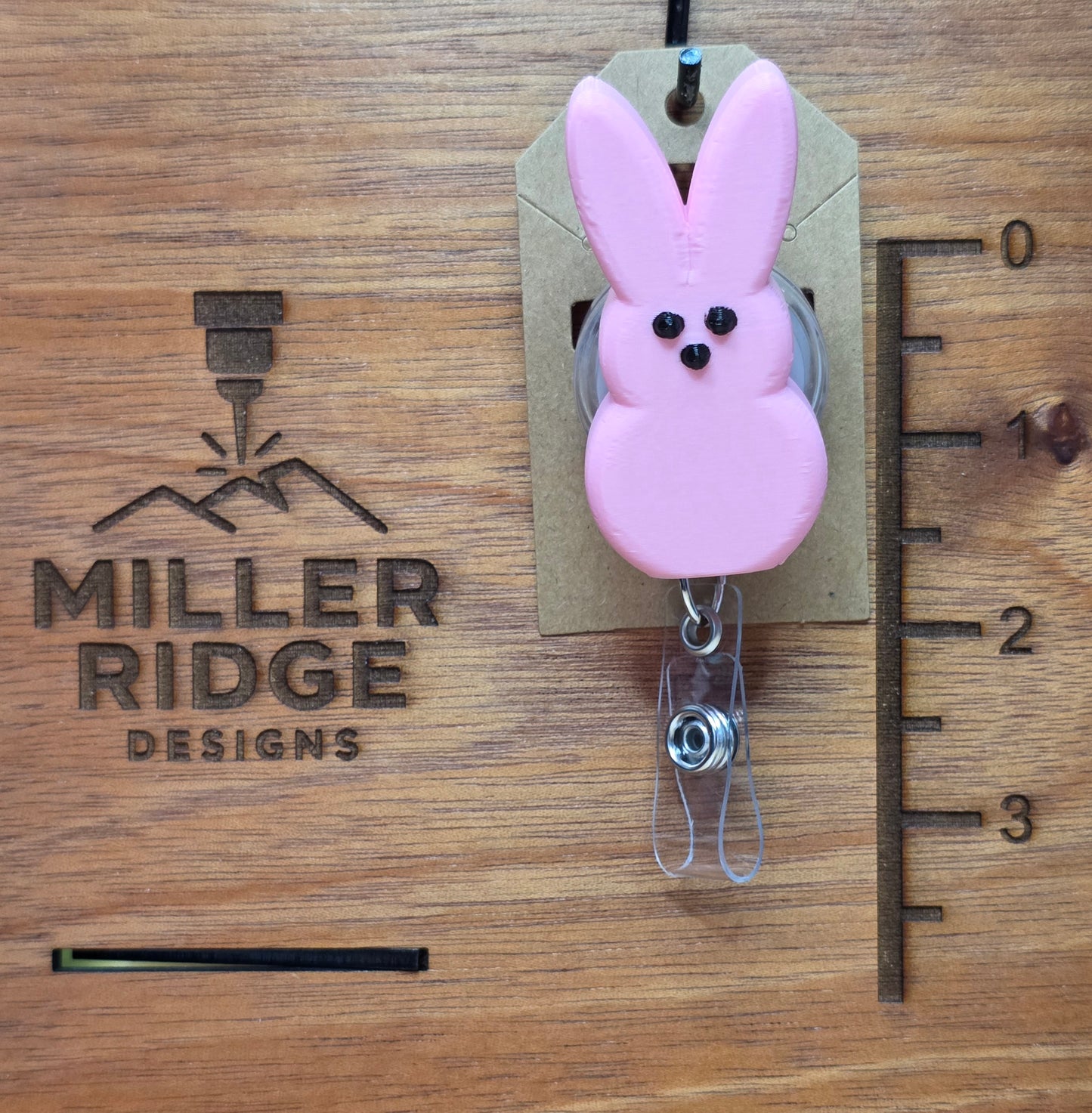 Pink "Peeps" bunny badge reel