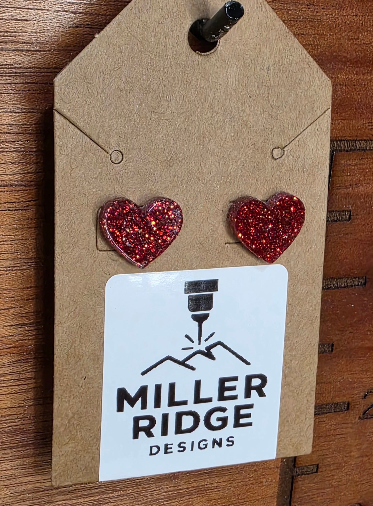 Red glitter heart studs
