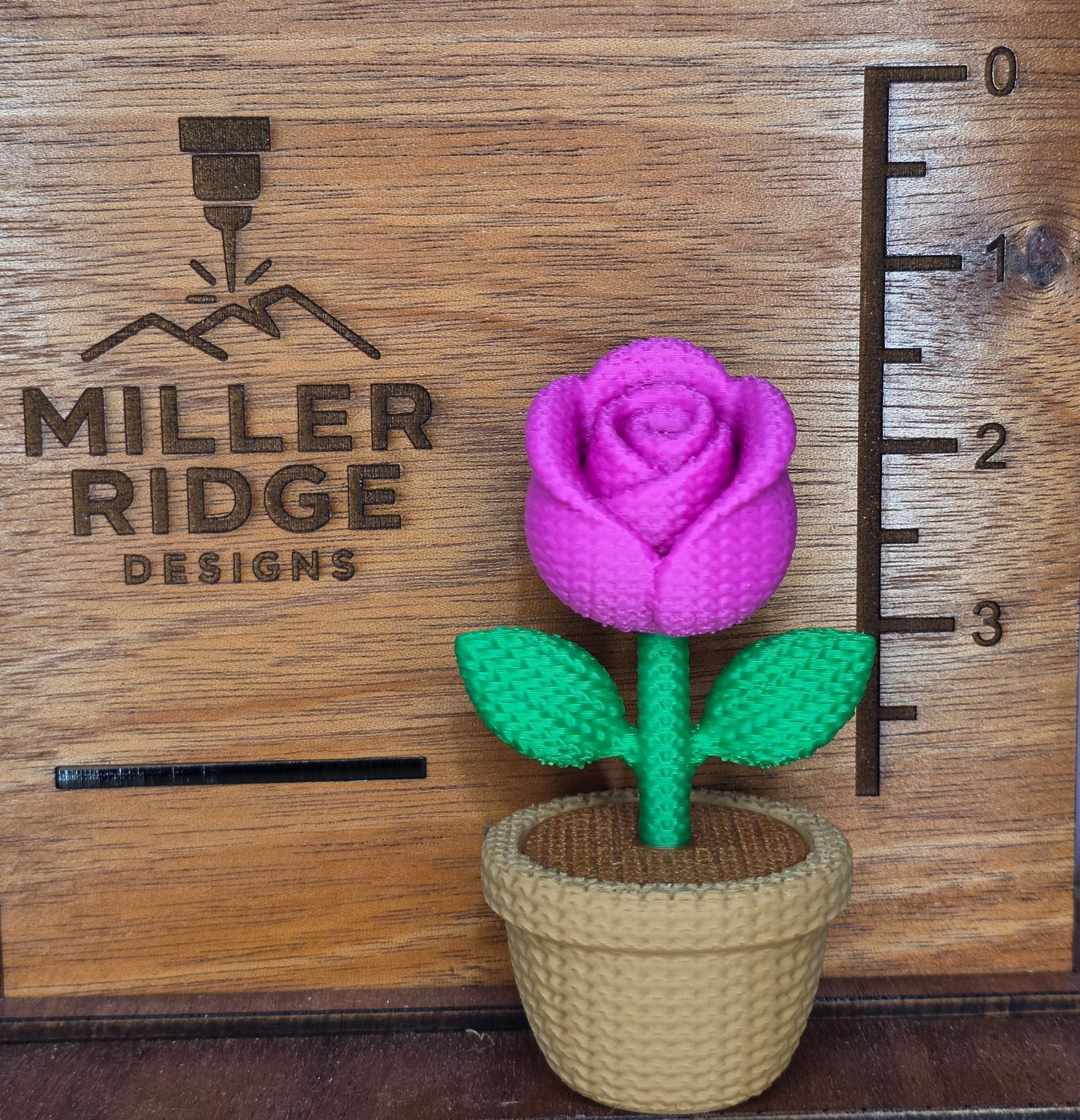 Knitted pink rose flower pot