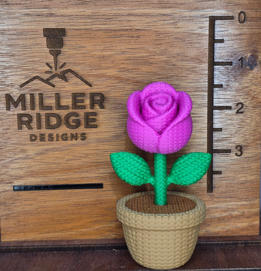 Knitted pink rose flower pot