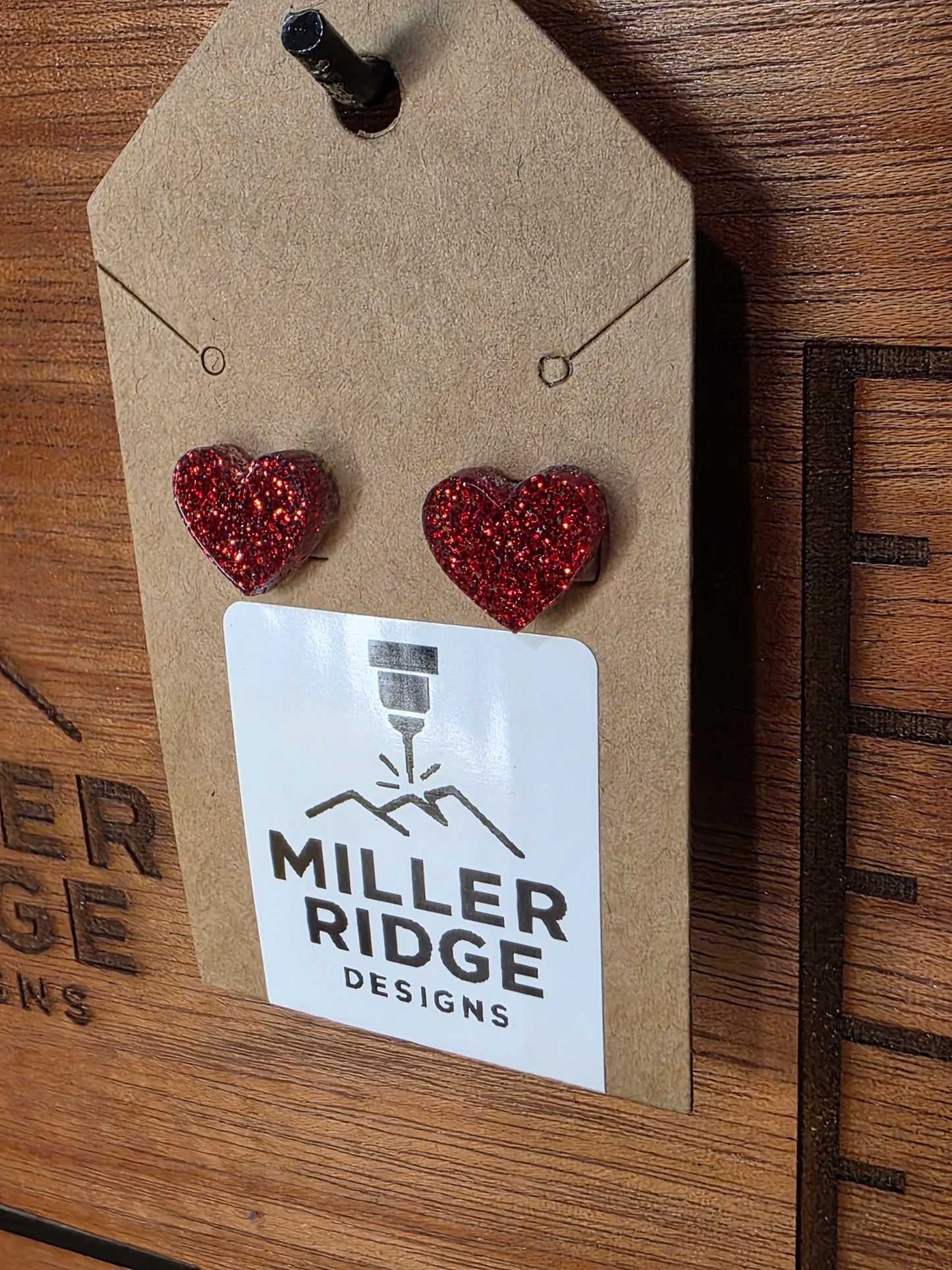 Red glitter heart studs