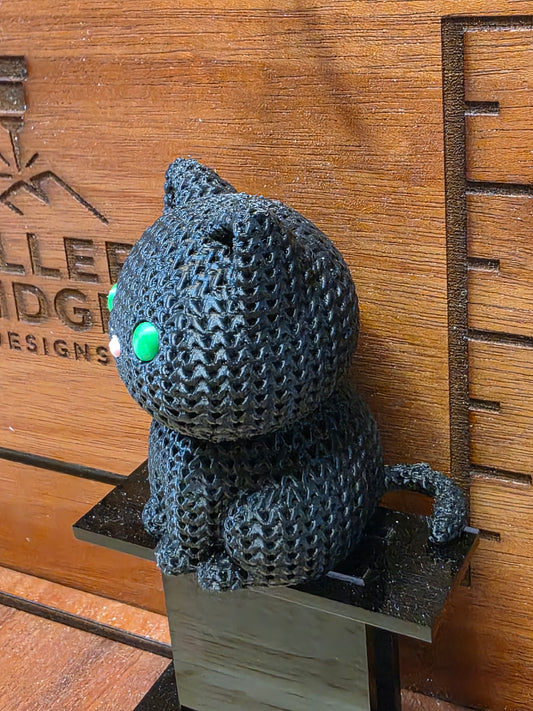 Black cat with green eyes