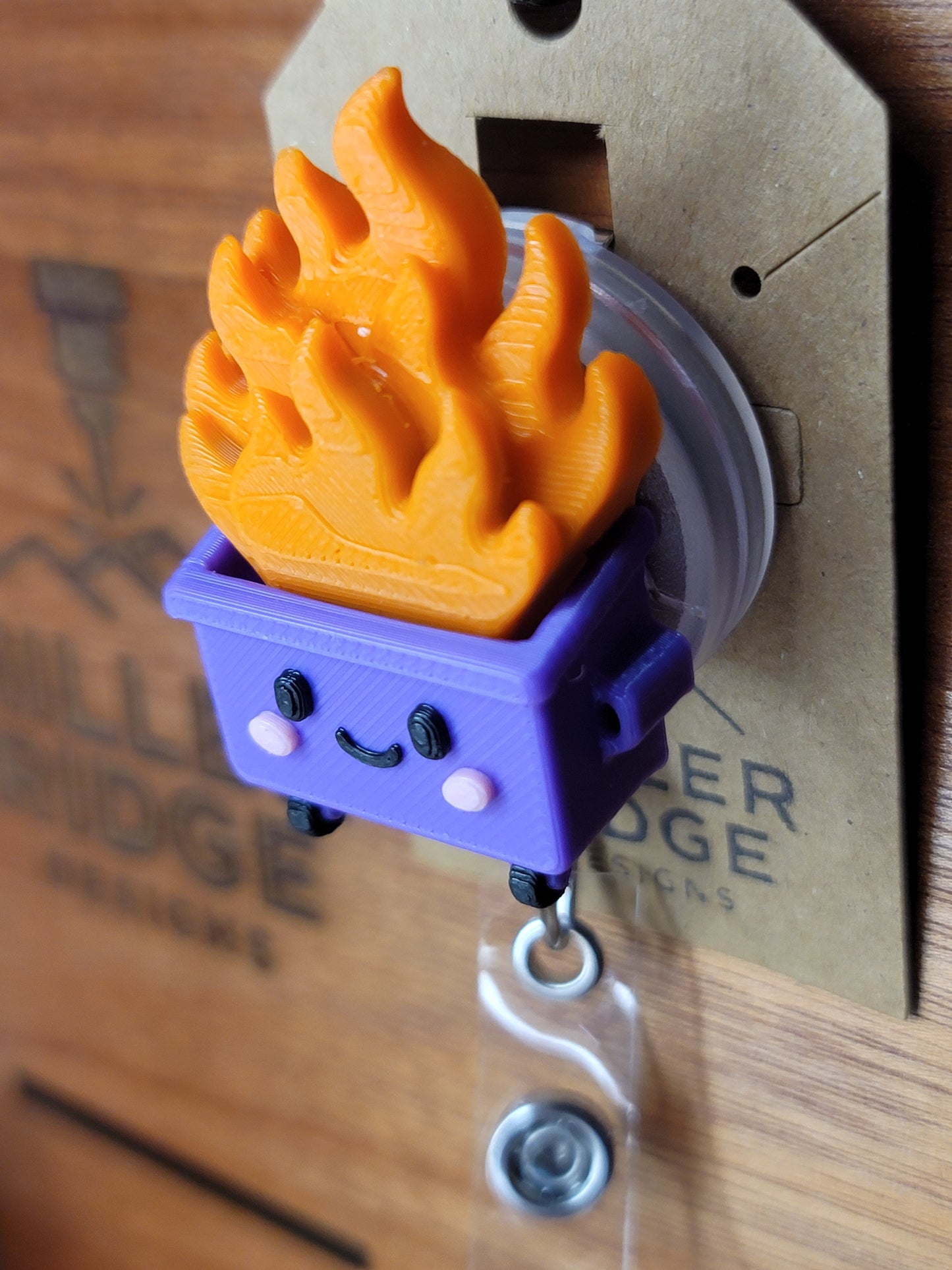 Dumpster fire badge reel (purple)