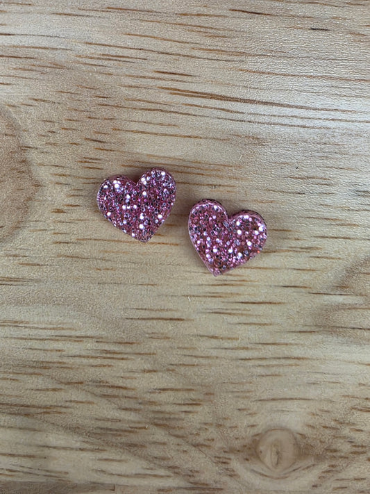 Pink glitter heart studs