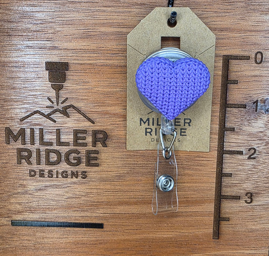 Purple knitted heart badge reel