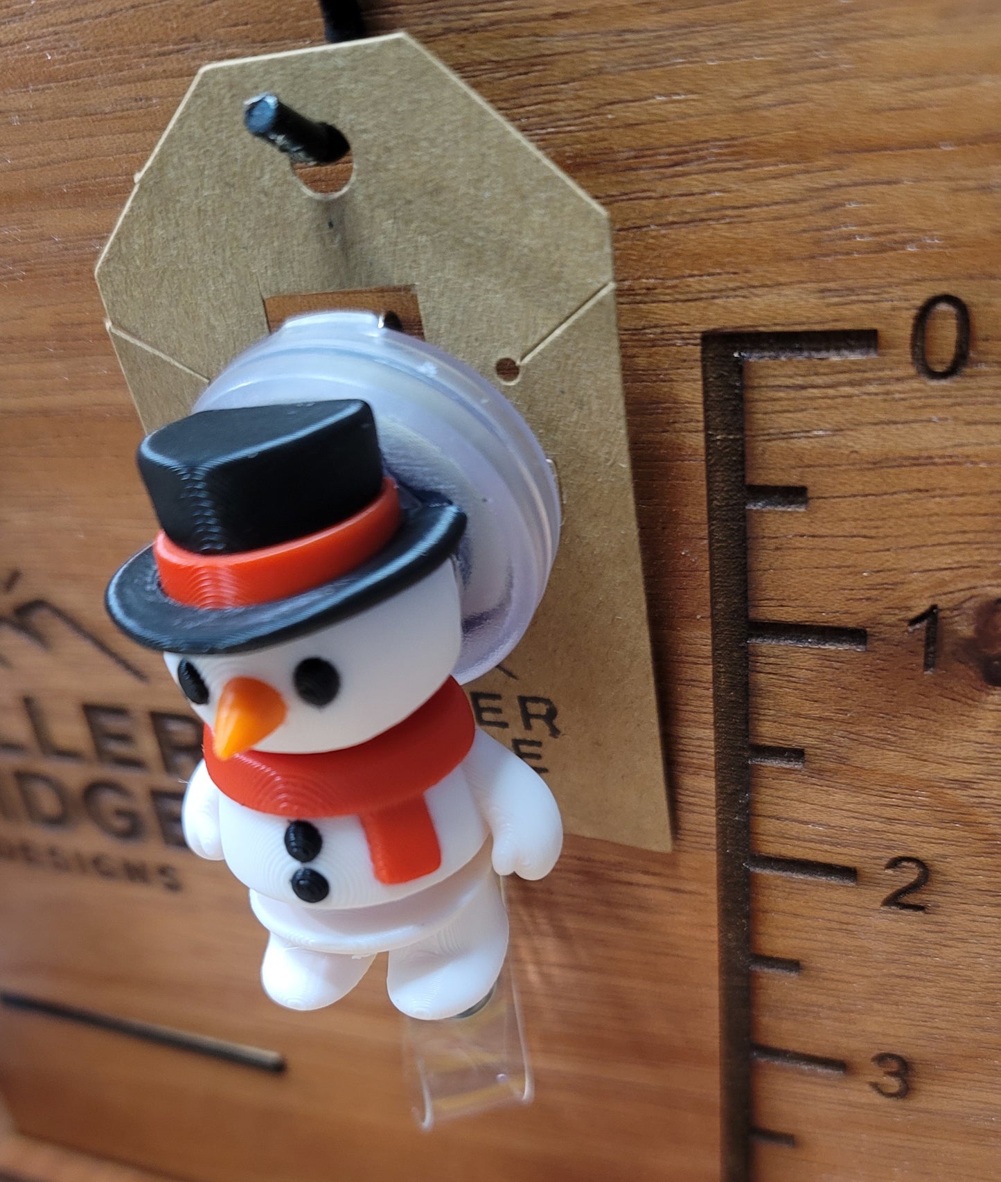 Snowman badge reel (red scarf)