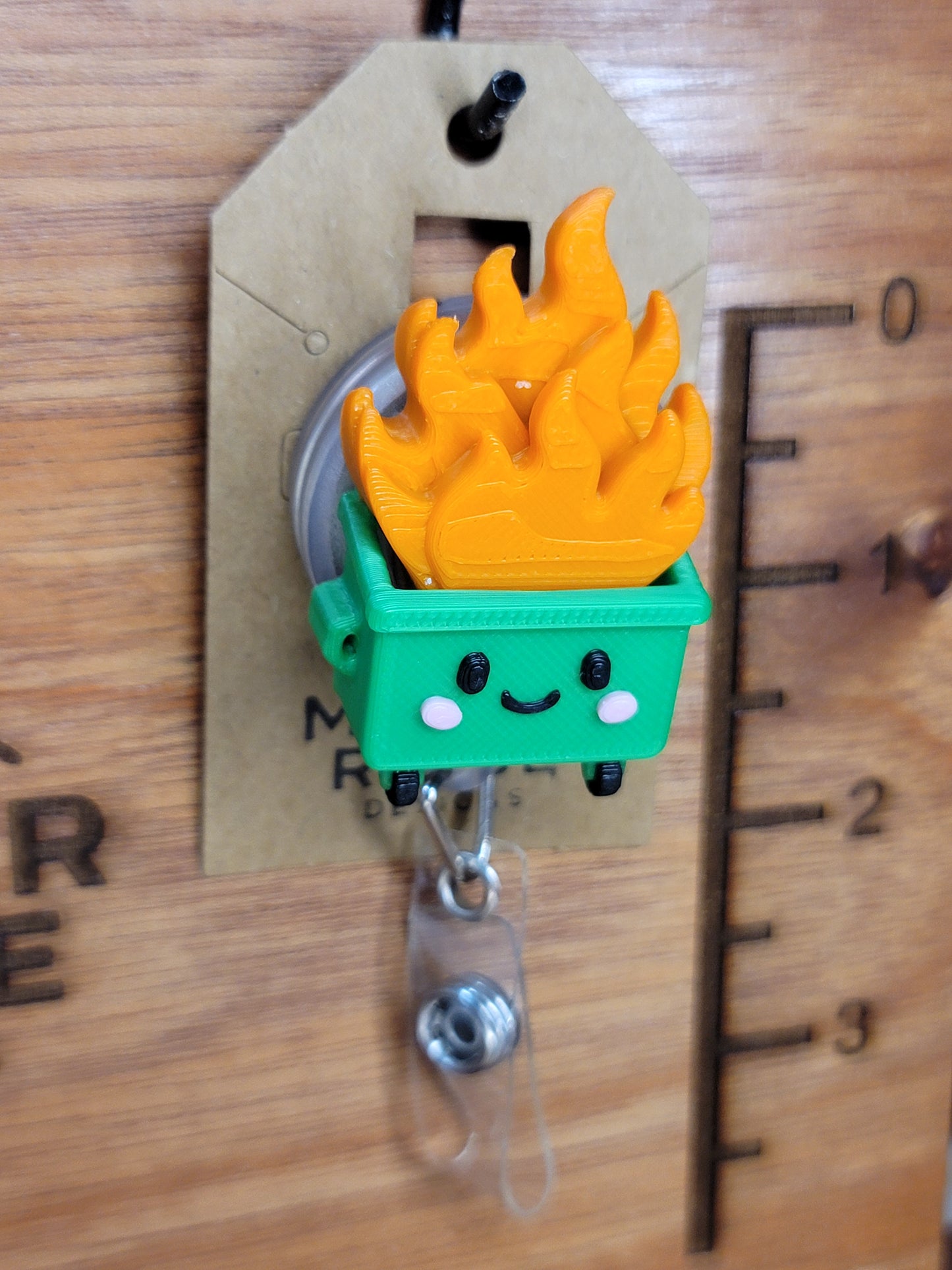 Dumpster fire badge reel (green)