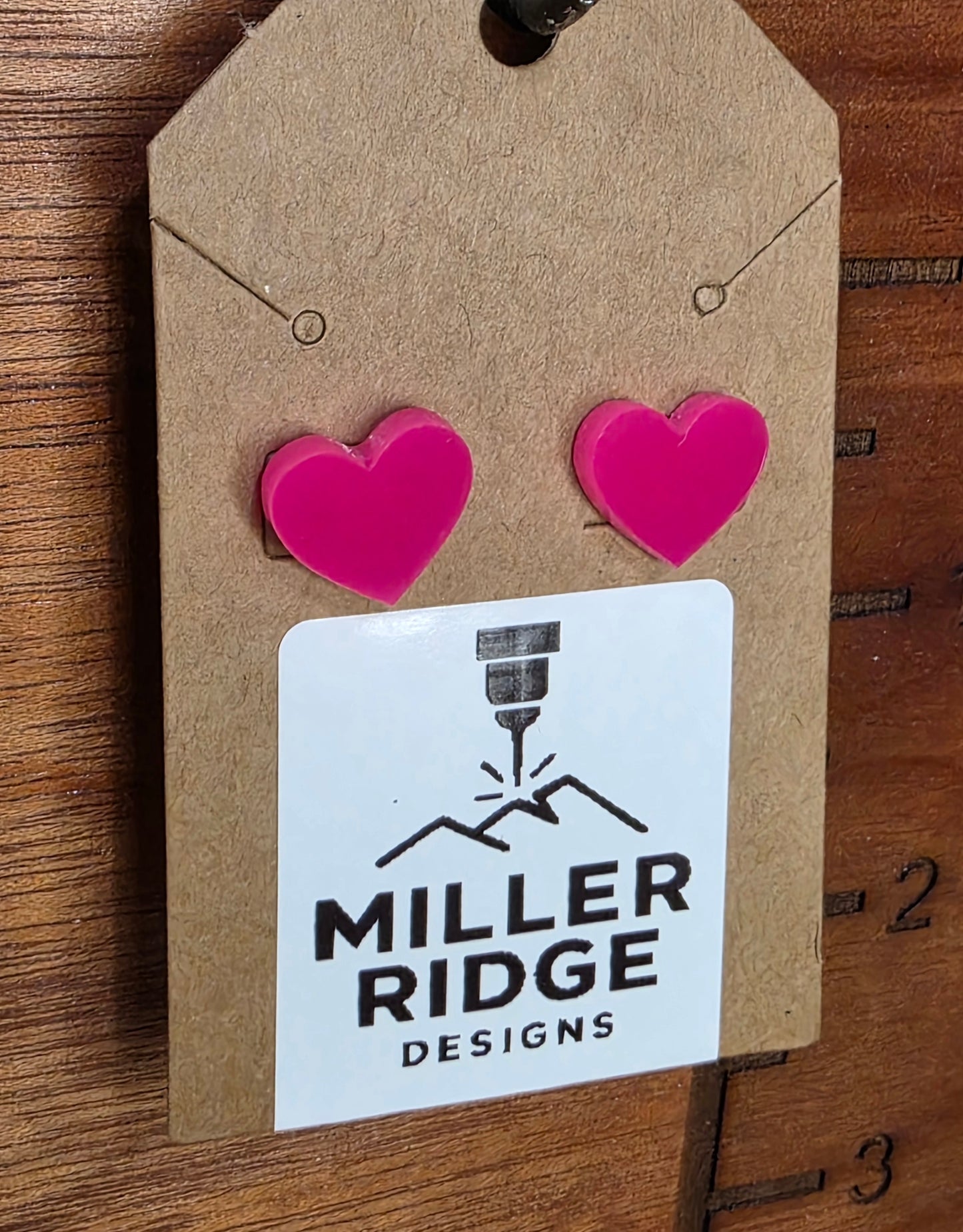 Pink heart studs