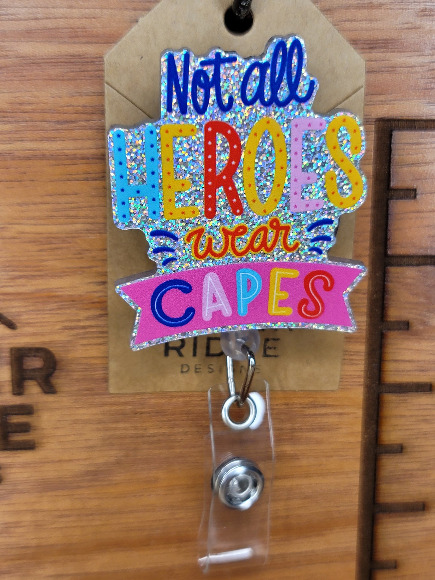 Not all heroes wear capes badge reel