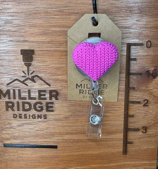Pink knitted heart badge reel