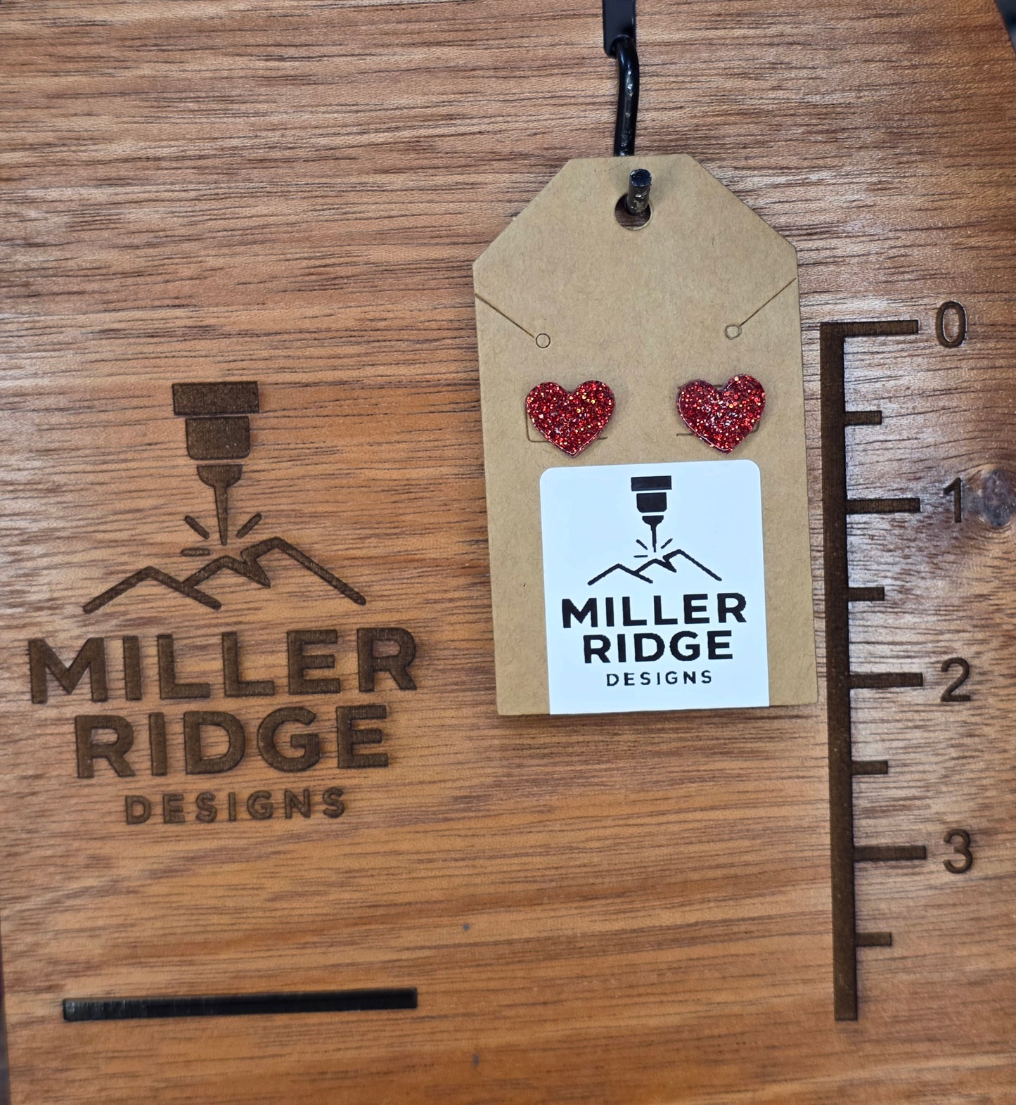 Red glitter heart studs