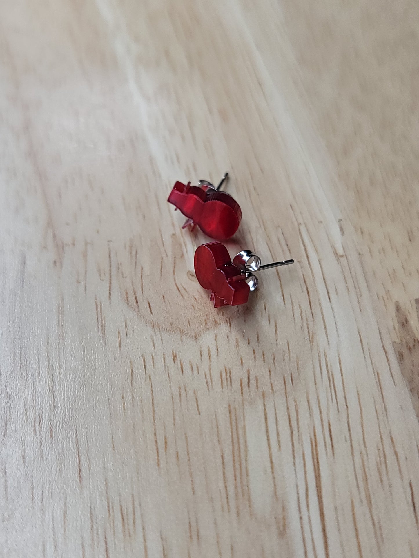 Red snowman studs