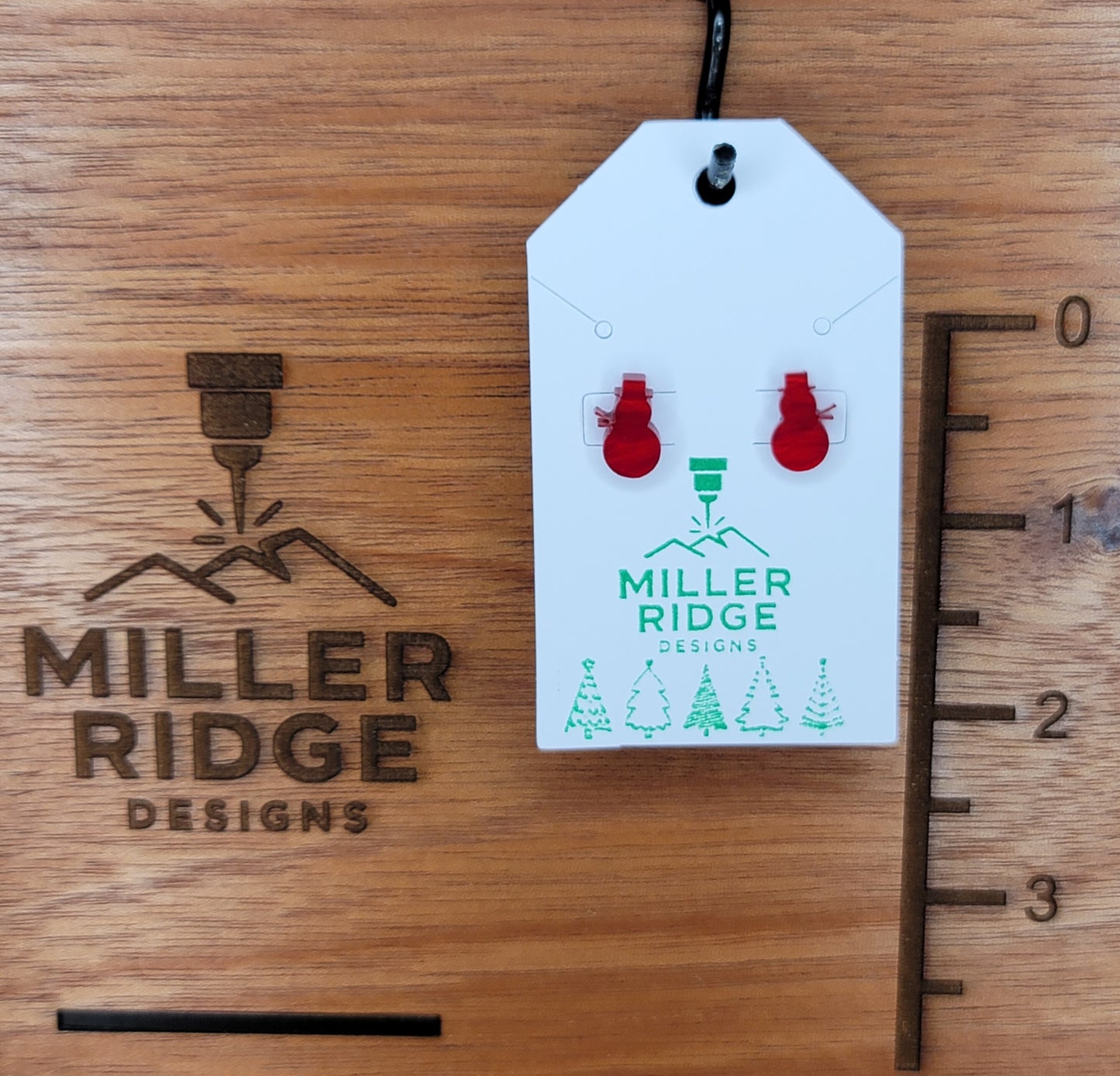 Red snowman studs