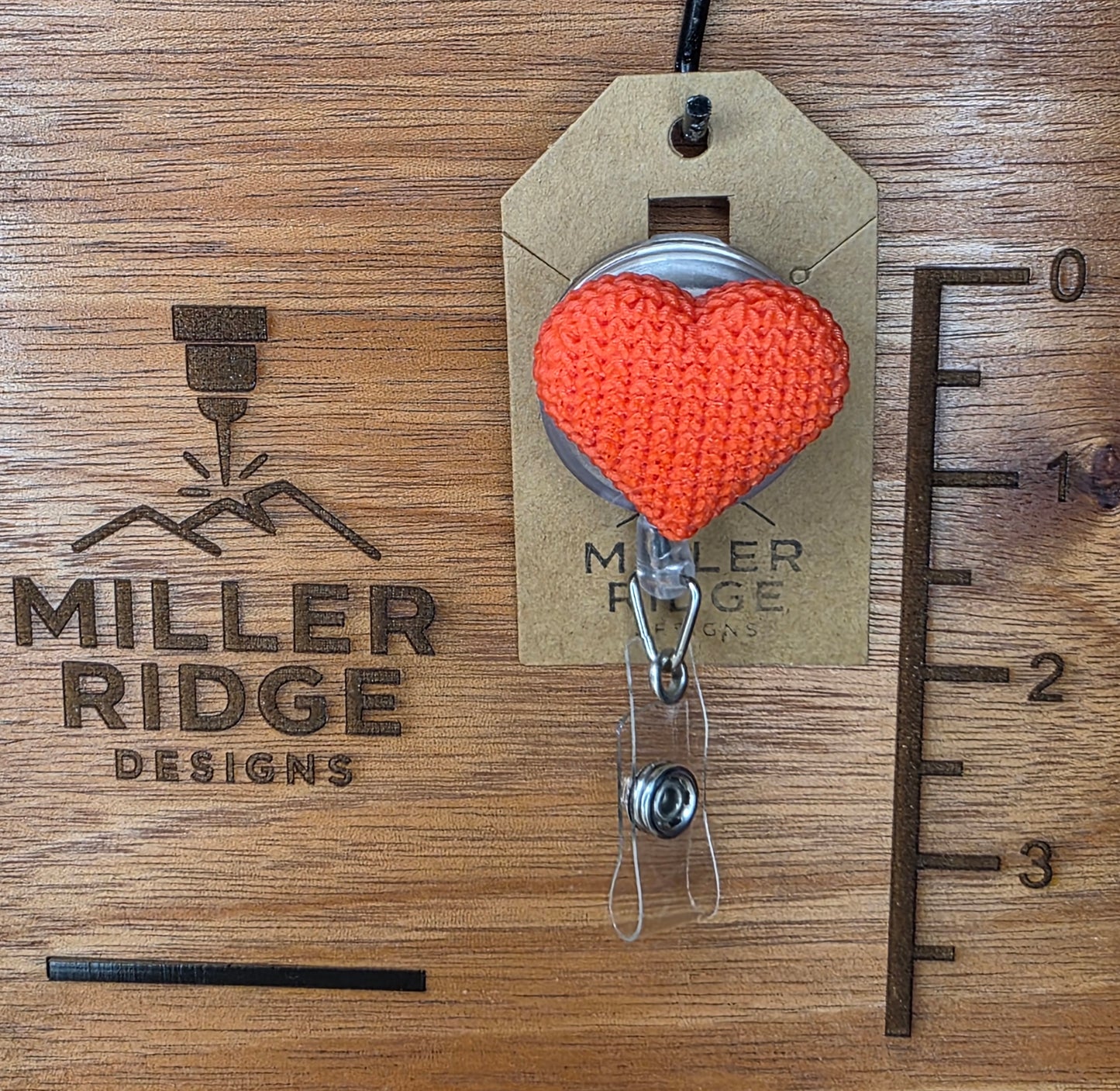 Red knitted heart badge reel