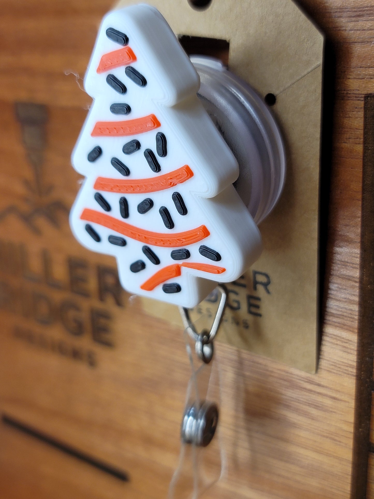 Christmas tree treat badge reel (black sprinkles)