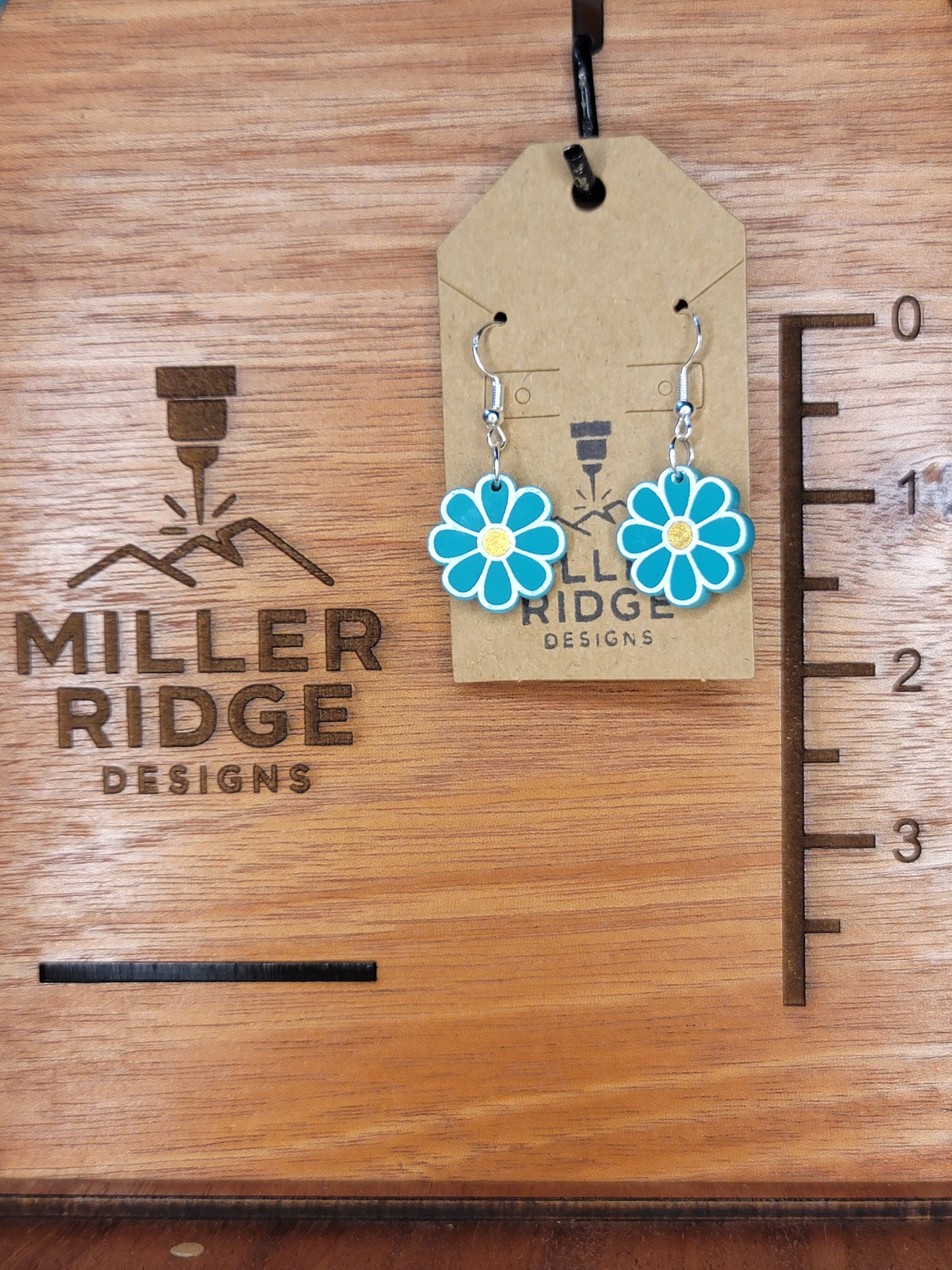 Daisy (teal)