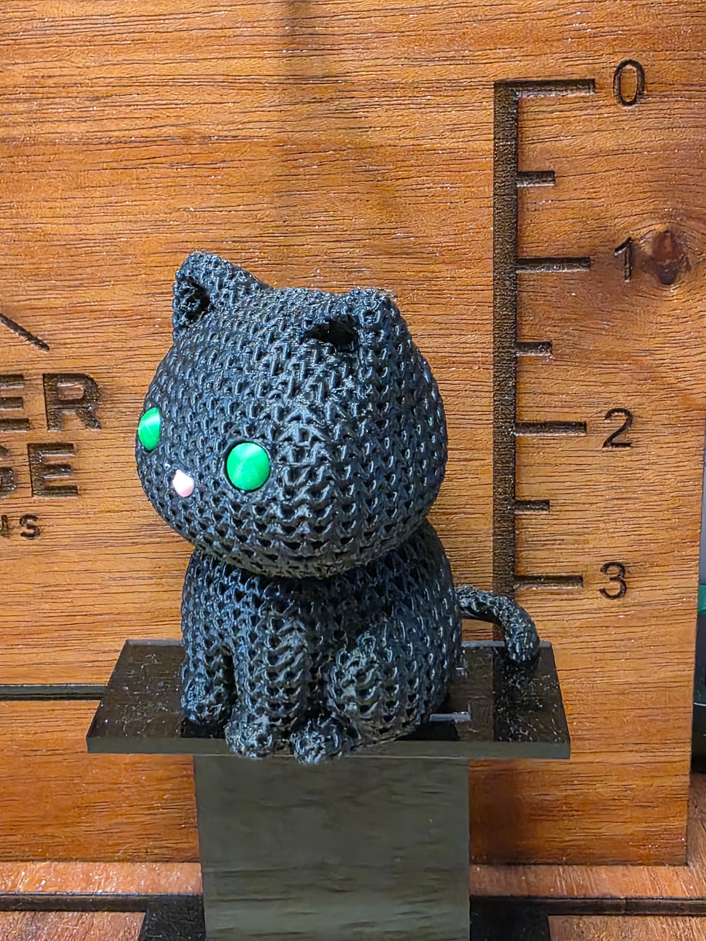 Black cat with green eyes