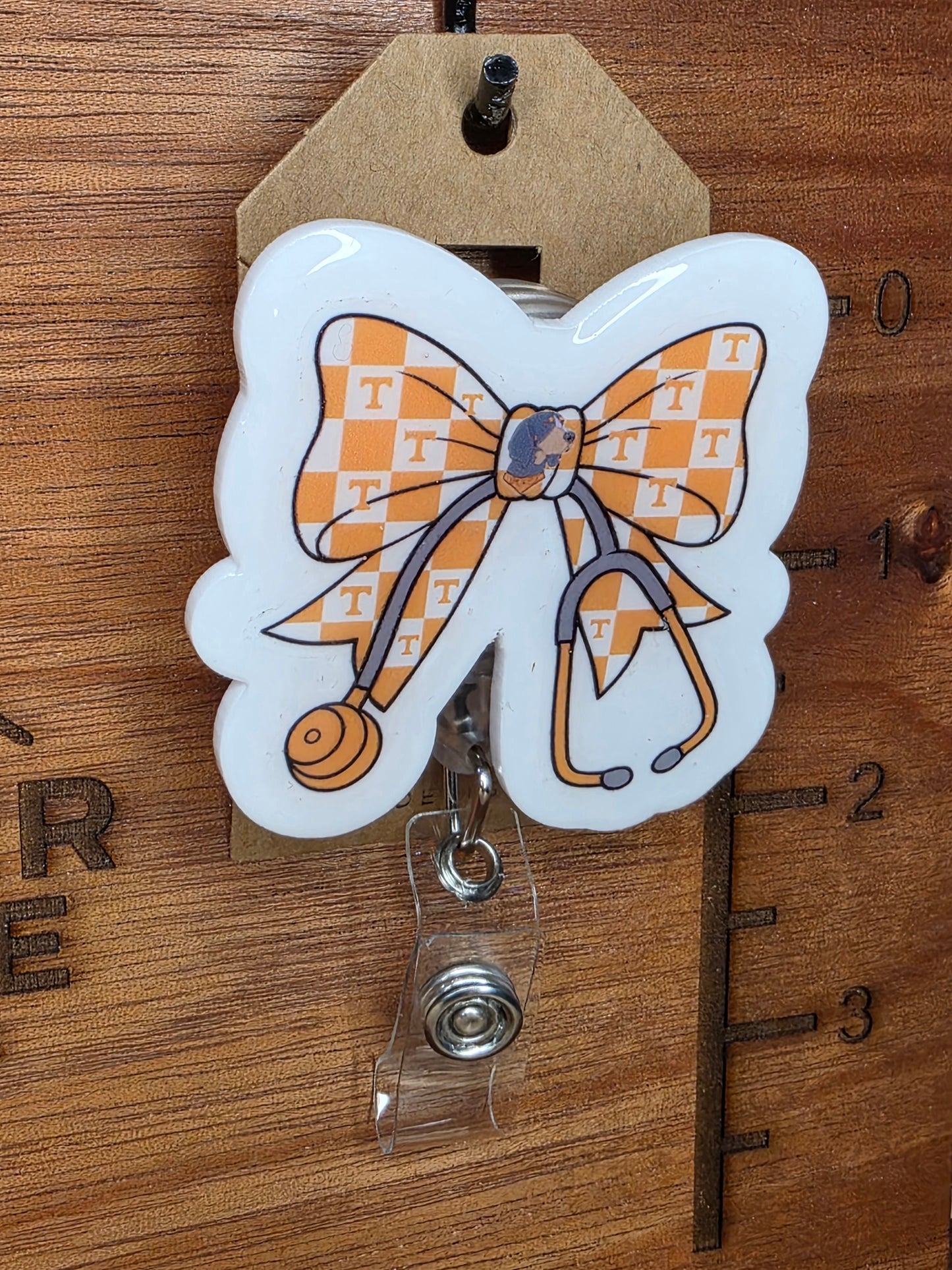 Checkered bow and stethoscope badge reel
