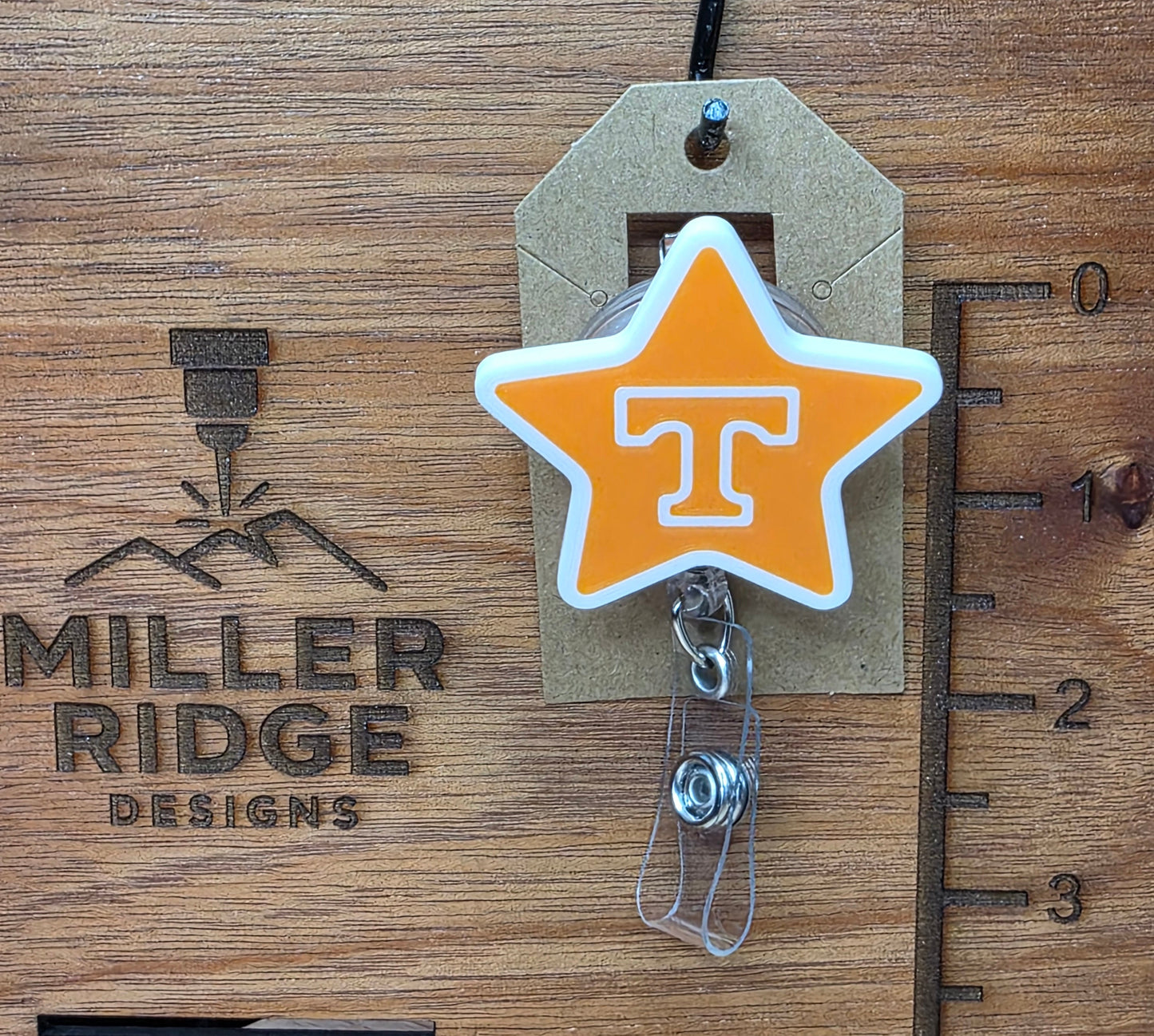 Tennessee T badge reel