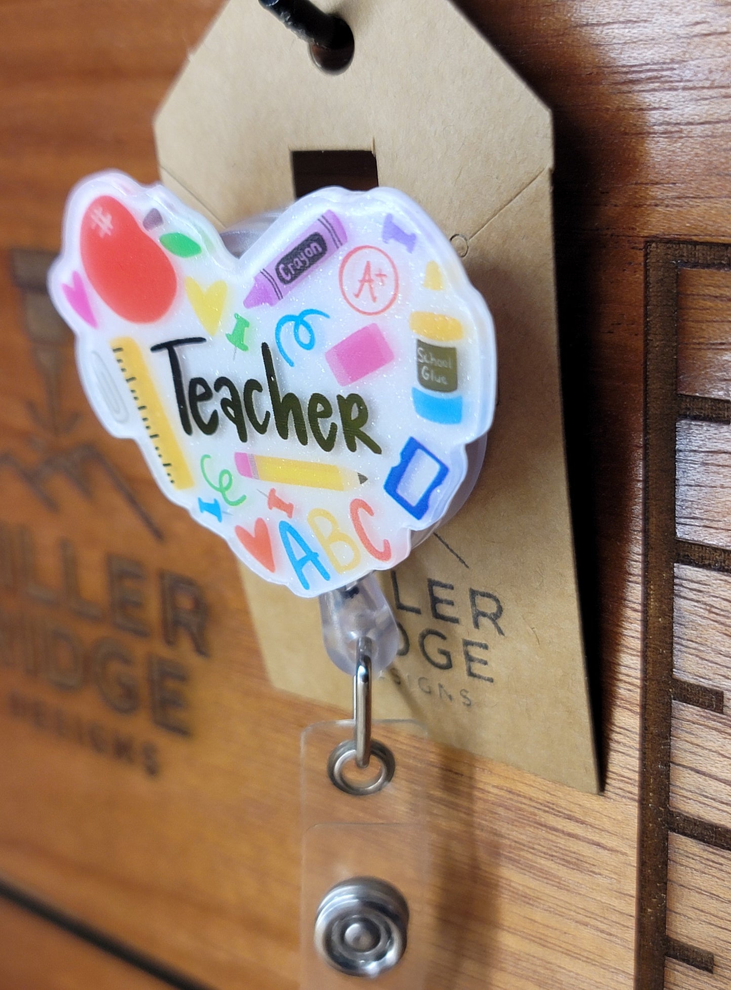 Teacher badge reel
