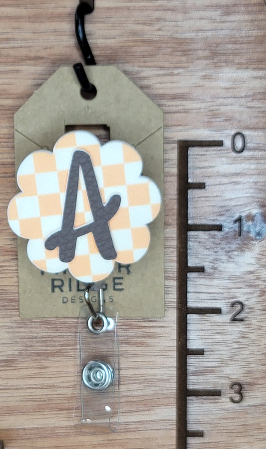 Checkerboard with initial badge reel