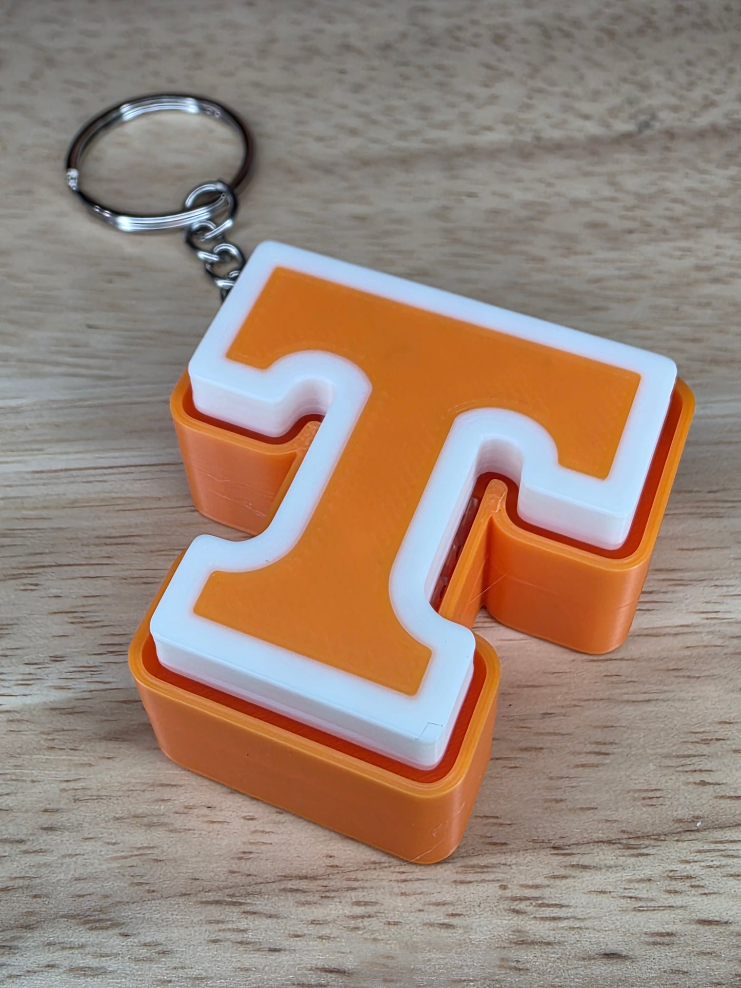 Power T fidget clicker keychain