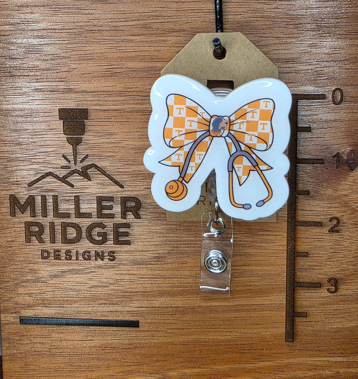 Checkered bow and stethoscope badge reel