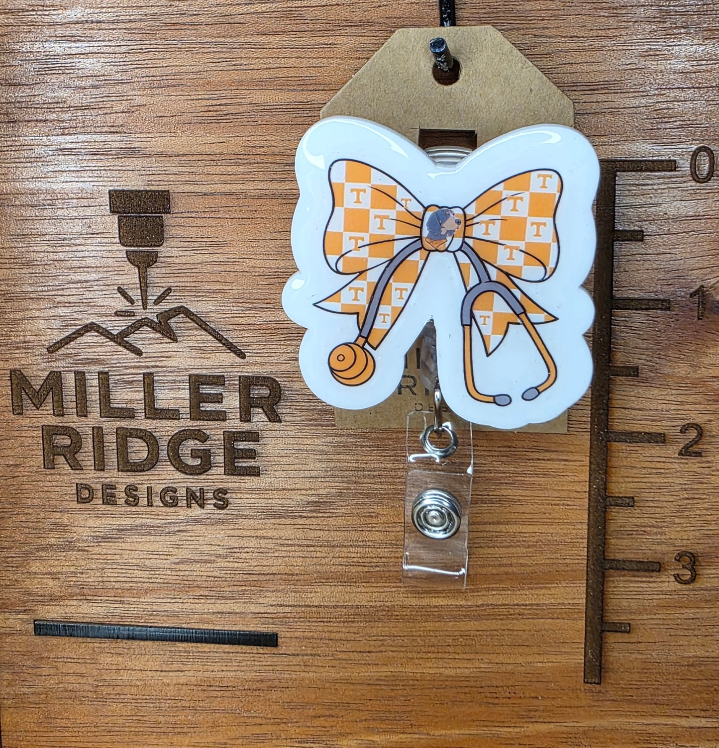 Checkered bow and stethoscope badge reel