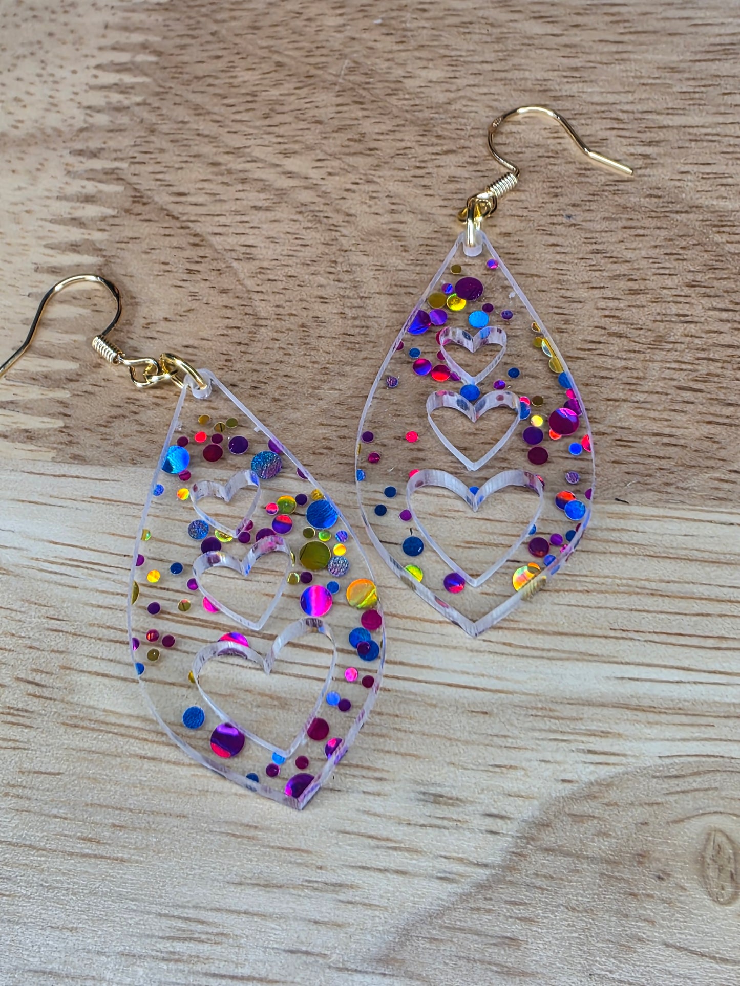 triple hearts-clear with glitter